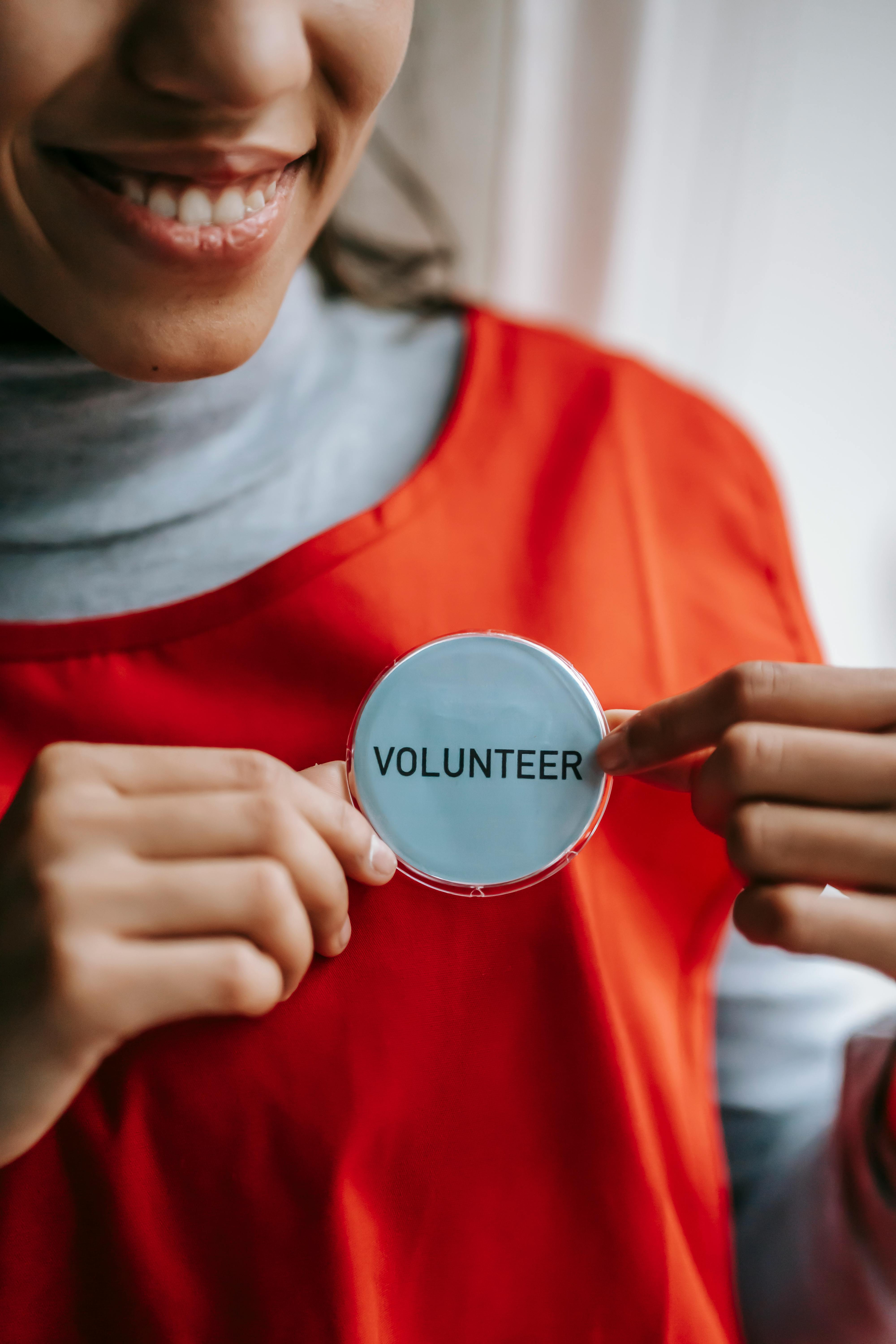 Person volunteering and gaining valuable experience